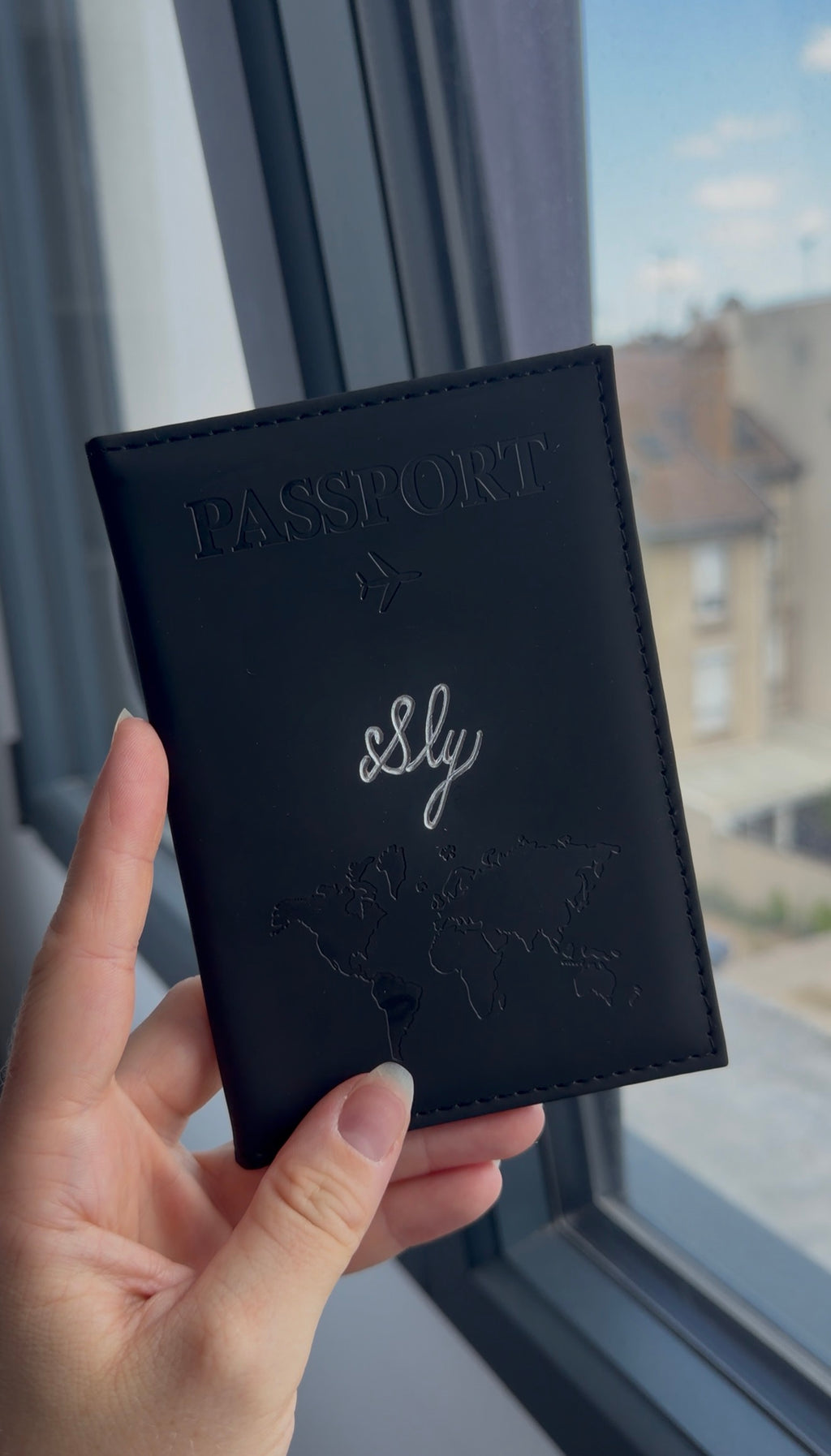 Porte-passeport mappemonde